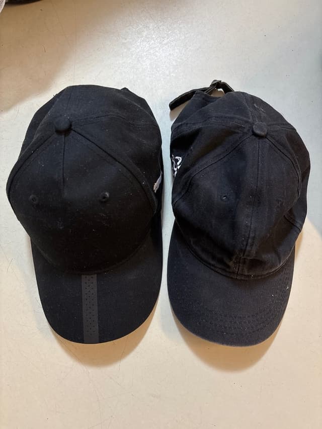 2 black Caps