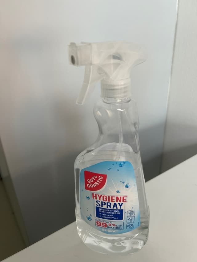 Broom and dustpan and cleaning spray
